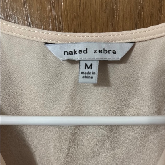 Naked Zebra Cream Ruffled Sleeveless Blouse - Picture 2 of 3